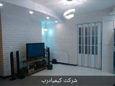 درب آکاردئونی پی وی سی پنجره دار 